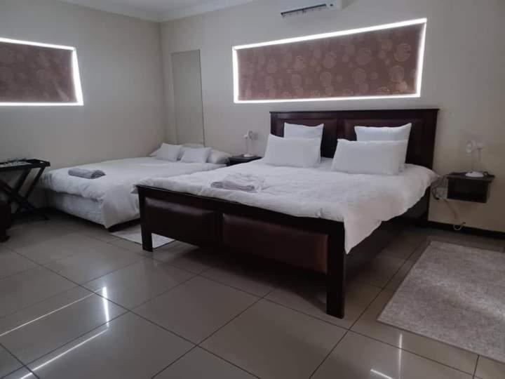 Carlo'S Boutique Guesthouse Уолфиш-Бей Номер фото